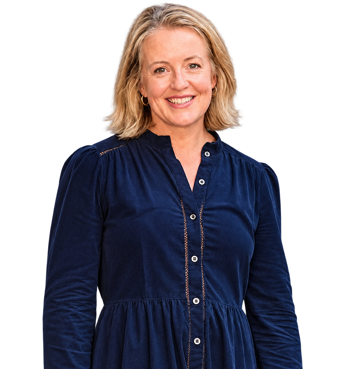 Kate Nolan smiling, wearing a navy dress
